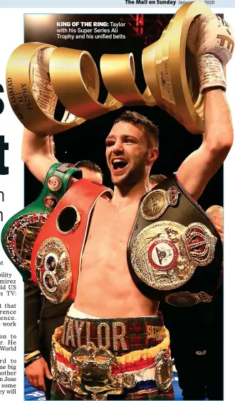  ??  ?? KING OF THE RING: Taylor with his Super Series Ali Trophy and his unified belts