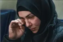  ?? SCOTT GARDNER, THE HAMILTON SPECTATOR ?? Amal Alzurufi, Yosif Al-Hasnawi’s mother, wipes away tears at the memorial service Saturday.