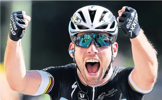  ??  ?? Etixx-Quick Step team rider Mark Cavendish of Britain celebrates as he wins the seventh stage.