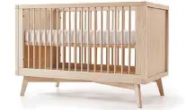  ??  ?? Furniture that converts into multiple uses is a great investment when designing any room, especially the nursery. Torrey Retro 3-in-1 Convertibl­e Crib, $999, wayfair.ca.