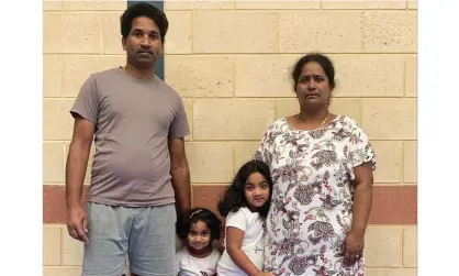  ??  ?? Tamil couple Nades (left) and Priya Murugappan (right) with their Australian-born daughters, Kopika and Tharunicaa, at the detention centre on Christmas Island.