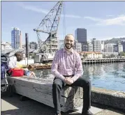  ?? NICK PERRY / ASSOCIATED PRESS ?? Nick Piesco, 40, posing for a photo in Wellington, New Zealand, moved to the city from another tech hub, Austin, to take a job as a developer at Xero, an online accounting software company.