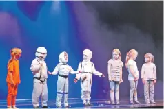  ??  ?? Primary 1-3 from Sandbank Primary performing their space-themed play.