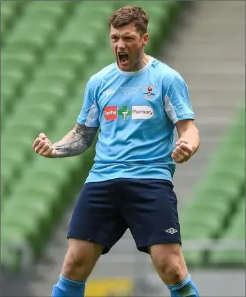  ??  ?? Kyle Dempsey celebrates after scoring his penalty in the dramatic FAI Junior Cup final shoot-out win over Pike Rovers in the Aviva Stadium. Dempsey grabbed one of the goals on Sunday as North End beat Moyne Rangers 4-0 to close in on the Premier...