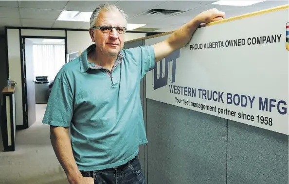  ?? LARRY WONG ?? Rob Pangrass, president of Western Truck Body Manufactur­ing, is struggling to get by in an iffy economy. “We’re making less money because of our prices and we’re making less money because the cost of renting a building is going up because of the taxes,” Pangrass says.