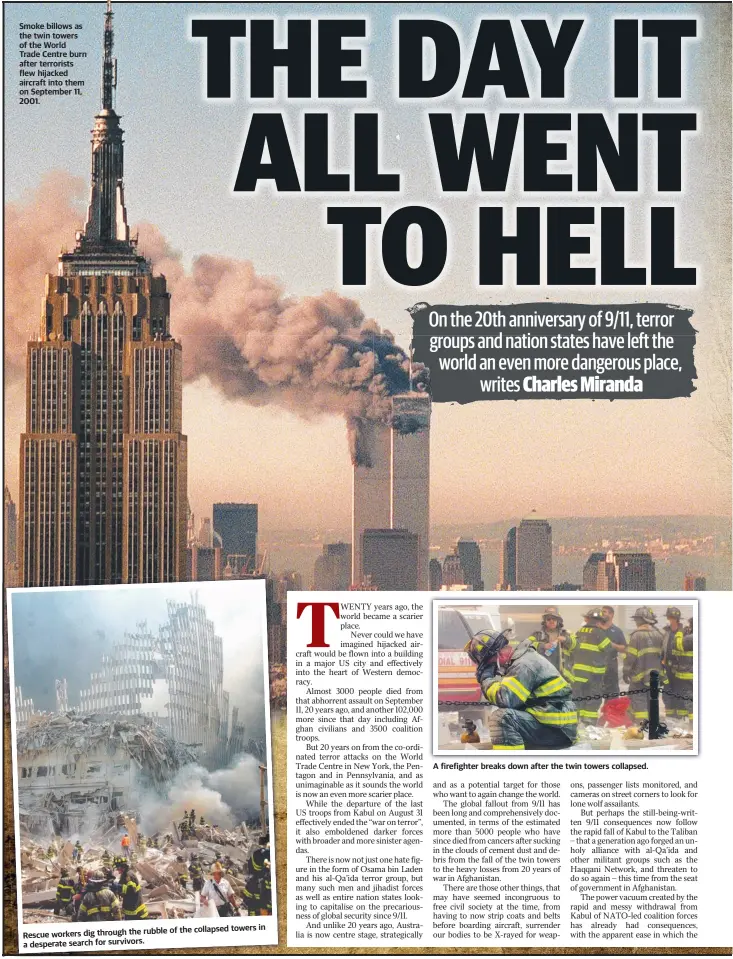  ??  ?? Smoke billows as the twin towers of the World Trade Centre burn after terrorists flew hijacked aircraft into them on September 11, 2001. to wers in through the rubble of the collapsed
Rescue workers dig a desperate search for sur vivors.
A firefighte­r breaks down after the twin towers collapsed.