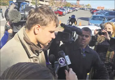  ?? David Collins / Associated Press file photo ?? Nathan Carman speaks to reporters in 2016 outside St. Patrick-St. Anthony Church in Hartford after a memorial service for his mother, Linda Carman, who was lost at sea.