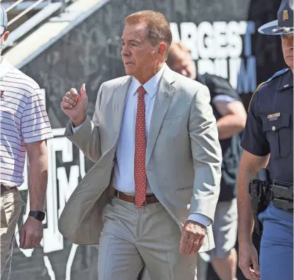  ?? TROY TAORMINA/USA TODAY SPORTS ?? Alabama Crimson Tide head coach Nick Saban arrives at Kyle Field on Saturday before the game against the Texas A&M Aggies.