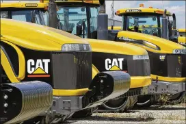  ?? SETH PERLMAN / ASSOCIATED PRESS ?? Tuesday’s worries began to set in after machinery maker Caterpilla­r said it doesn’t expect to top its first-quarter profit for the rest of this year.