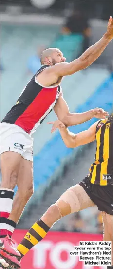  ?? ?? St Kilda’s Paddy Ryder wins the tap over Hawthorn’s Ned Reeves. Picture: Michael Klein