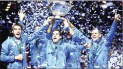  ?? AFP ?? (Left to right) Argentina’s Leonardo Mayer, Federico Delbonis, Guido Pella, Juan Martin del Potro and coach Daniel Orsanic celebrate with the Davis Cup trophy on Sunday.