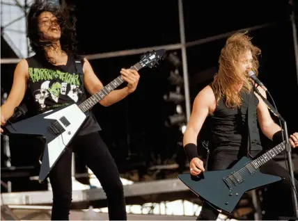  ??  ?? above
Kirk and James on stage in 1991, as Metallica toured The Black Album