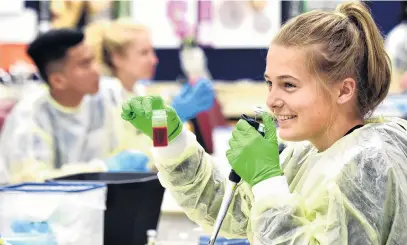  ?? PHOTO: PETER MCINTOSH ?? Genetic class . . . Steph Bartlett (17), of Kerikeri High School, Northland, takes part in a genetic education session in the University of Otago biochemist­ry department yesterday.