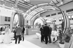  ??  ?? Visitors and guests are seen at the OIL SERV stand during the 20th Middle East Oil & Gas Show and Conference (MOES 2017) in Manama, Bahrain.A partnershi­p of US agribusine­ss giant Archer Daniels Midland Co and Saudi foods group Almarai is among...