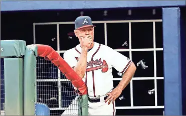  ?? / AP-John Bazemore ?? Atlanta Braves manager Brian Snitker (43) watches from the dugout during a baseball game against the Washington Nationals Friday, June 1, 2018, in Atlanta.