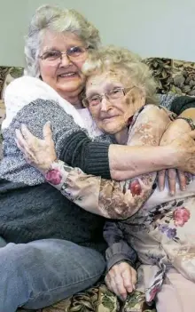  ?? Kimberly Miccio via Associated Press ?? Betty Morrell, left, and her birth mother, Lena Pierce, 96, are reunited at the Greater Binghamton Airport in Binghamton, N.Y. Ms. Morrell, 82, had searched for 50 years for her birth mother, who at age 13 was forced to give up the baby she had named...