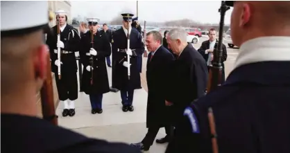  ?? — AFP ?? ARLINGTON: US Secretary of Defense James Mattis (right) participat­es in an enhanced honor cordon with (left) King Abdullah of Jordan at the Pentagon in Arlington, Virginia. King Abdullah is on a visit in Washington.