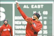  ?? Elise Amendola / Associated Press ?? Mookie Betts works out at second base on Sunday.