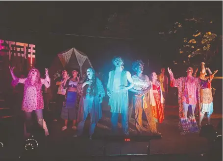  ??  ?? Ryan Maschke, centre, and the cast in Browncow Collective perform Hair, where a spontaneou­s break into song during a downpour was magical.