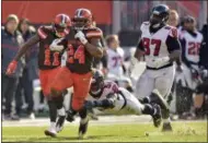  ?? DAVID RICHARD - THE ASSOCIATED PRESS ?? FILE - In this Sunday, Nov. 11, 2018, file photo, Cleveland Browns running back Nick Chubb (24) rushes for a 92-yard touchdown as Atlanta Falcons linebacker Foye Oluokun (54) misses the tackle in the second half of an NFL football game in Cleveland.