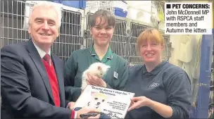  ??  ?? PET CONCERNS: John McDonnell MP with RSPCA staff members and Autumn the kitten