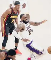  ?? MARCIO JOSE SANCHEZ/AP ?? LeBron James suffered a high ankle sprain Saturday and will be out indefinite­ly. The Lakers already were without Anthony Davis and Marc Gasol.