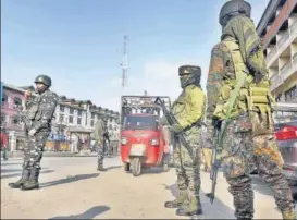  ?? ANI ?? Security personnel stand guard at Lal Chowk amid high alert following the recent civilian killings by terrorists, in Srinagar on Tuesday.