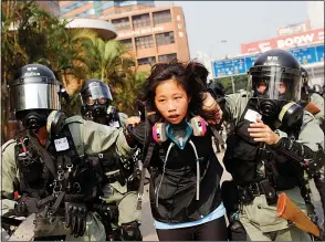  ?? Picture: THOMAS Peter/reuters ?? CLASH: Protester is detained by riot police in Hong Kong last year