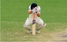  ?? GETTY IMAGES ?? England captain Joe Root feeling unwell at the crease under the blazing Australian sun.