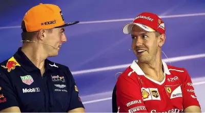  ?? (LaPresse) ?? Pace fatta Max Verstappen e Sebastian Vettel sorridono nella sala stampa del circuito di Sepang. In Malesia il tedesco ha già vinto quattro volte: nel 2015 fu il primo successo con la Ferrari