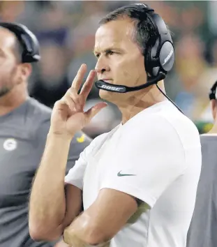  ?? MIKE ROEMER/AP ?? Packers defensive coordinato­r Joe Barry is seen during the first half of a preseason game against the Texans on Aug. 14 in Green Bay, Wis.