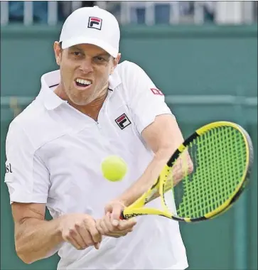  ?? Daniel Leal-Olivas AFP/Getty Images ?? SAM QUERREY returns against Tennys Sandgren in a four-set win that went nearly three hours. In Wednesday’s quarterfin­als, he will face Rafael Nadal, who defeated Joao Sousa on Monday in straight sets.