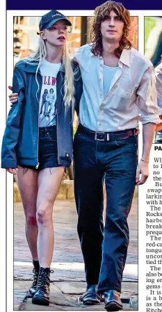  ?? ?? SNAPPY COUPLE: Peaky Blinders star Anya strolls around Sydney with guitarist partner Malcolm