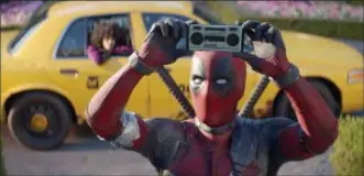  ?? TWENTIETH CENTURY FOX VIA AP, FILE ?? This image released by Twentieth Century Fox shows Ryan Reynolds in a scene from “Deadpool 2.” Fox’s “Deadpool 2” brought in $125 million according to studio estimates Sunday and ended the three-week reign of Disney’s “Avengers: Infinity War” at the...