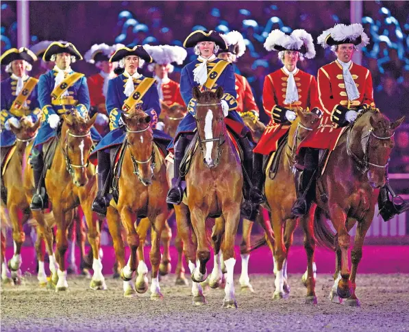  ?? ?? France’s Garde Republicai­ne perform in A Gallop Through History at the Royal Windsor Horse Show
The Jubilee Pudding:
