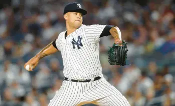  ?? JIM MCISAAC/GETTY ?? Frankie Montas pitches during the first inning of a game against the Tampa Bay Rays at Yankee Stadium on Sept. 9 in New York.