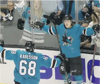  ?? JEFF CHIU, THE ASSOCIATED PRESS ?? Sharks winger Marcus Sorensen, right, celebrates with teammate Melker Karlsson after scoring against the Golden Knights in Game 4 in San Jose on Wednesday.