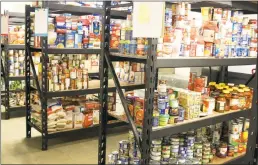  ??  ?? The Good Shepherd Food Pantry at Saint Mary Catholic Church, Newport in Charlotte Hall opened in February. The effort began after the Rev. Michael Briese took the helm at the parish last year.