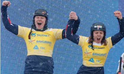  ?? Photograph: Zurab Kurtsikidz­e/EPA ?? Gold medal winners Charlotte Bankes and Huw Nightingal­e of Great Britain celebrate at the snowboard world championsh­ips in Georgia.