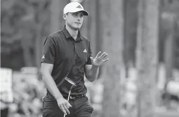  ?? AARON DOSTER USA TODAY NETWORK ?? Ludvig Aberg acknowledg­es the fans after making a putt on the ninth green during the final round of the RBC Heritage golf tournament on April 21 in Hilton Head, S.C.