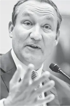  ??  ?? United Continenta­l Holdings CEO Oscar Munoz speaks during a House Transporta­tion and Infrastruc­ture Committee hearing in Washington on May 2. — WP-Bloombrg photo
