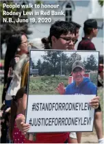  ??  ?? People walk to honour Rodney Levi in Red Bank, N.B., June 19, 2020