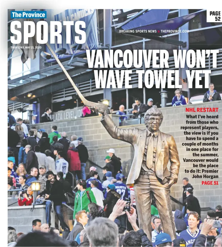  ?? IAN LINDSAY ?? A statue of ex-Canucks coach Roger Neilson and his white towel were unveiled before the NHL game against Minnesota on April 7, 2011, at Rogers Arena in Vancouver.