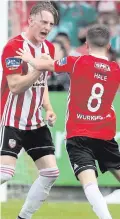  ??  ?? In vain: Derry City’s Ronan Curtis celebrates with Rory Hale after scoring a goal