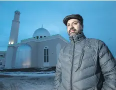  ?? LIAM RICHARDS ?? Shamoon Rashid, local president of the Ahmadiyya Muslim Jama’at, in front of the new mosque under constructi­on in Saskatoon.