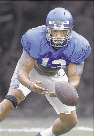  ?? MARK WEBER / THE COMMERCIAL APPEAL ?? University of Memphis defensive lineman DeMarco Montgomery spent two seasons playing at East Mississipp­i CC in Scooba. “There’s nothing to do — nothing but football,” Montgomery said of the experience.