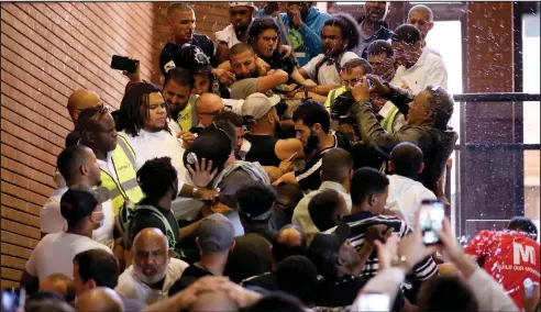  ??  ?? Protesters stormed Kensington Town Hall as they demanded answers over the Grenfell Tower blaze