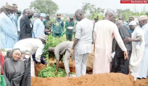  ?? PHOTO: Ikechukwu Ibe ?? The remains of General Hassan Ahmed being laid to rest at Lungi Barracks Cemetry yesterday. Inset: Wife of the deceased