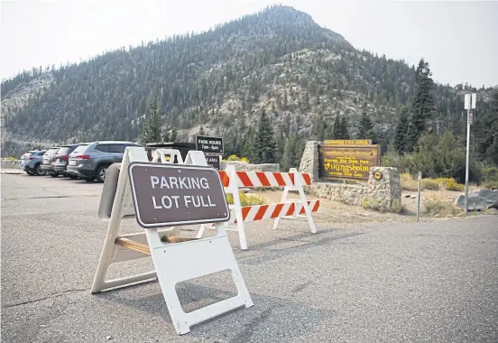  ??  ?? A ‘Parking Lot Full’ sign is displayed near Emerald Bay.