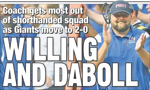  ?? Robert Sabo ?? WINNING UGLY: Giants coach Brian Daboll applauds his team during Sunday’s 19-16 win over the Panthers at MetLife Stadium. Daboll did something that Super Bowl-winning Giants coaches Bill Parcells and Tom Coughlin never did — win his first two games with Big Blue.